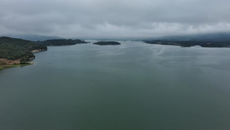 overcast day aerial view of nanclares de gamboa, basque country, serene waters
