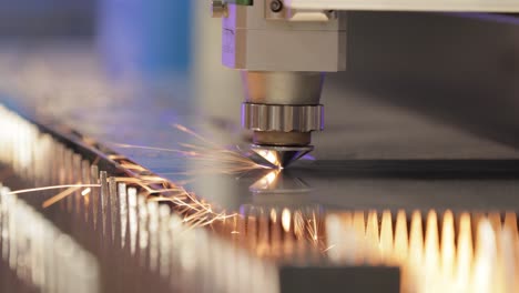 CNC-Laser-cutting-of-metal,-modern-industrial-technology.