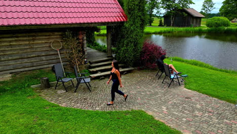 couple relaxing by the pond on a summer day