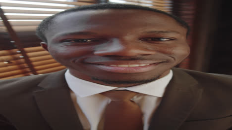 Portrait-of-Happy-Afro-American-Businessman-in-Formal-Suit