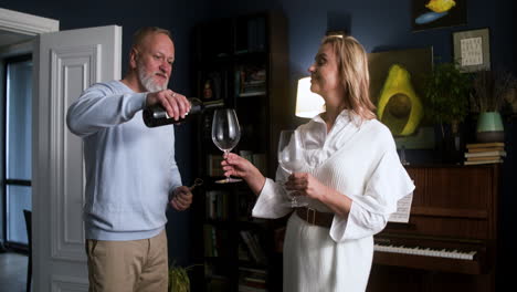 couple drinking wine at home