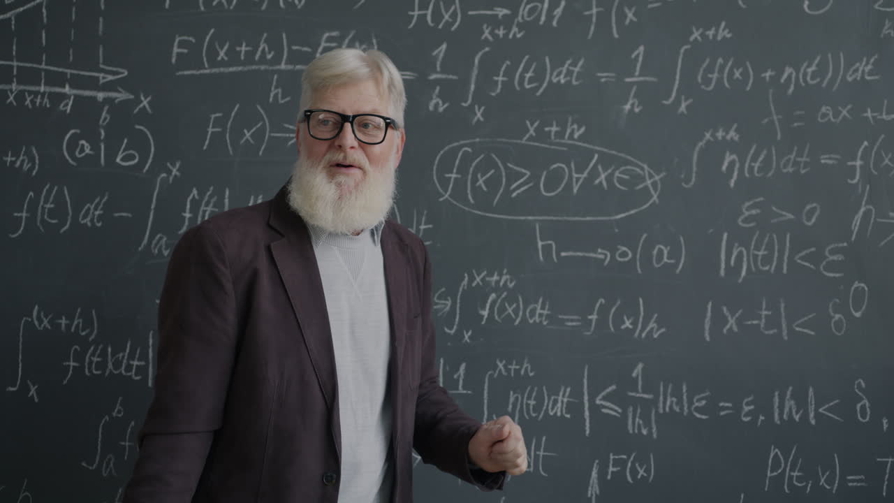 Professor Explaining Mathematics on a Blackboard