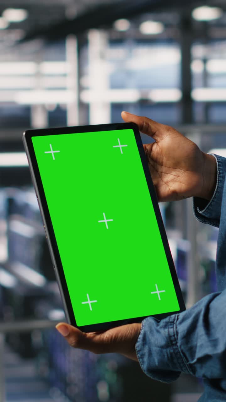 Vertical video Computer scientists in data center monitoring neural network LLM visualization