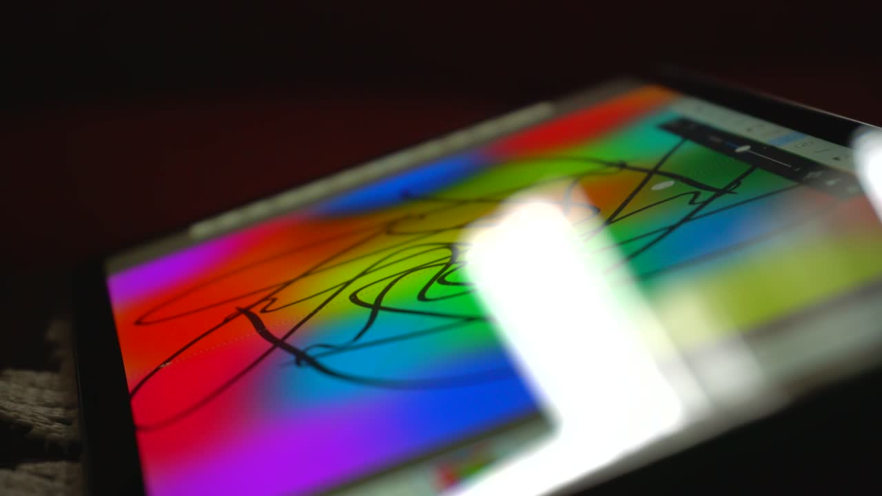 Creating art on drawing tablet with multiple sections of symmetry mirrored