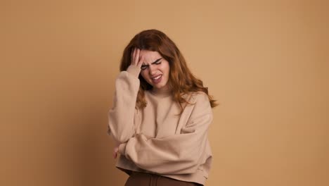 woman with bad memory gesturing upset or headache
