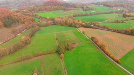 aerial-view-train-autumn-forest