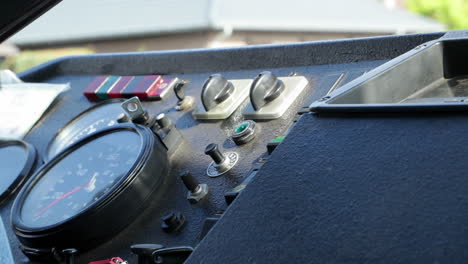 shot of the instrument panel and dashboard of an old bus coach