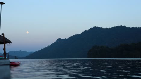 time-lapse of a tranquil lake at sunset