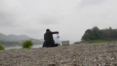 businessman relaxing by the river