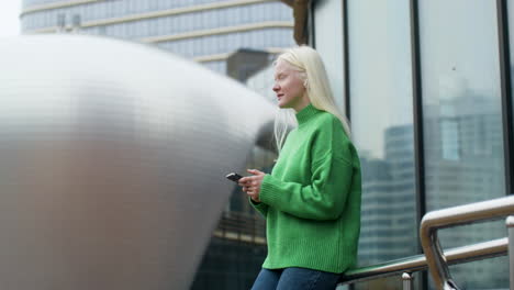 woman using smartphone outdoors