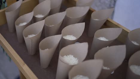 Wedding-rice-in-paper-cones-on-tray