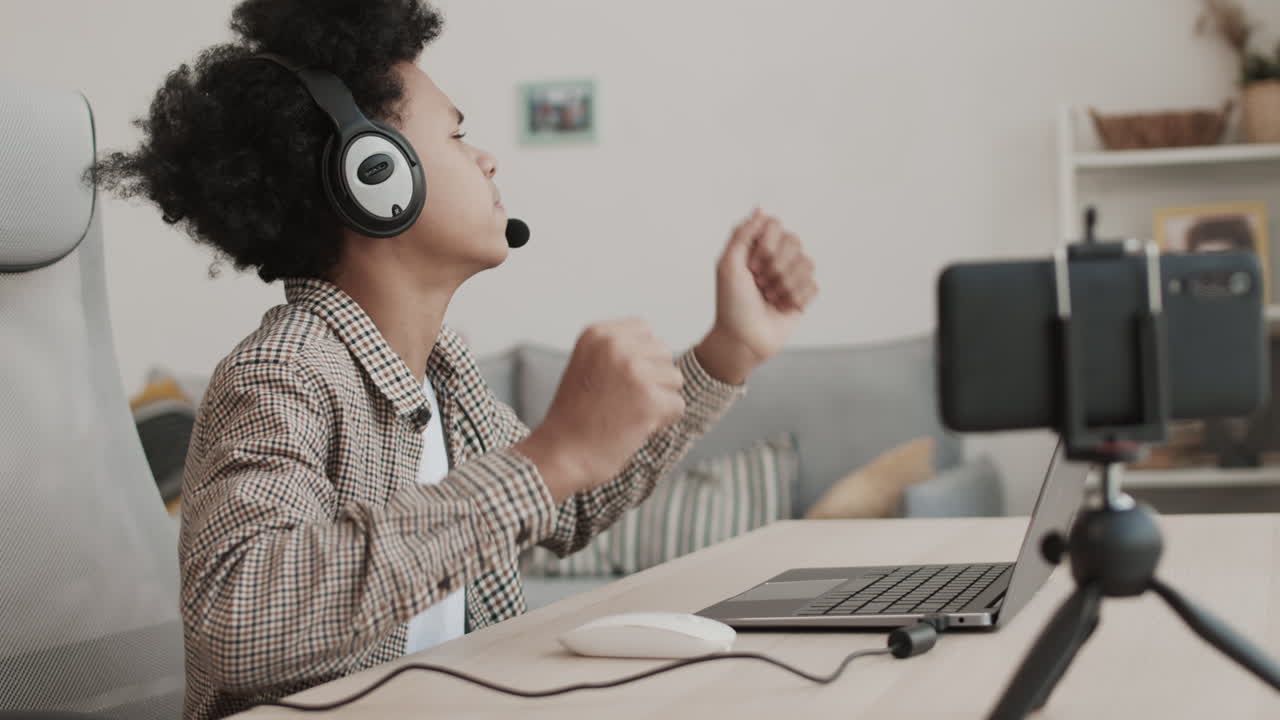 Teenager Losing in Computer Game