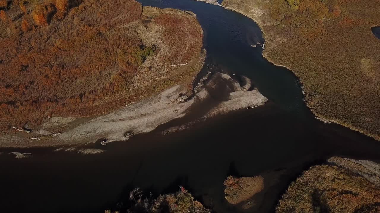 Panning Aerial Shot of a River in Montana. Golden Autumn Scene.