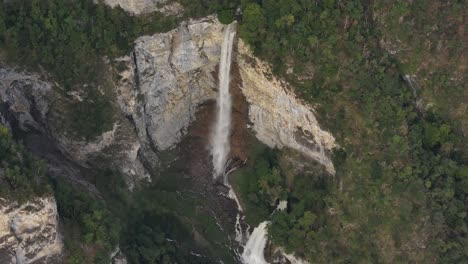aerial view of stunning waterfall cascading down a cliffside