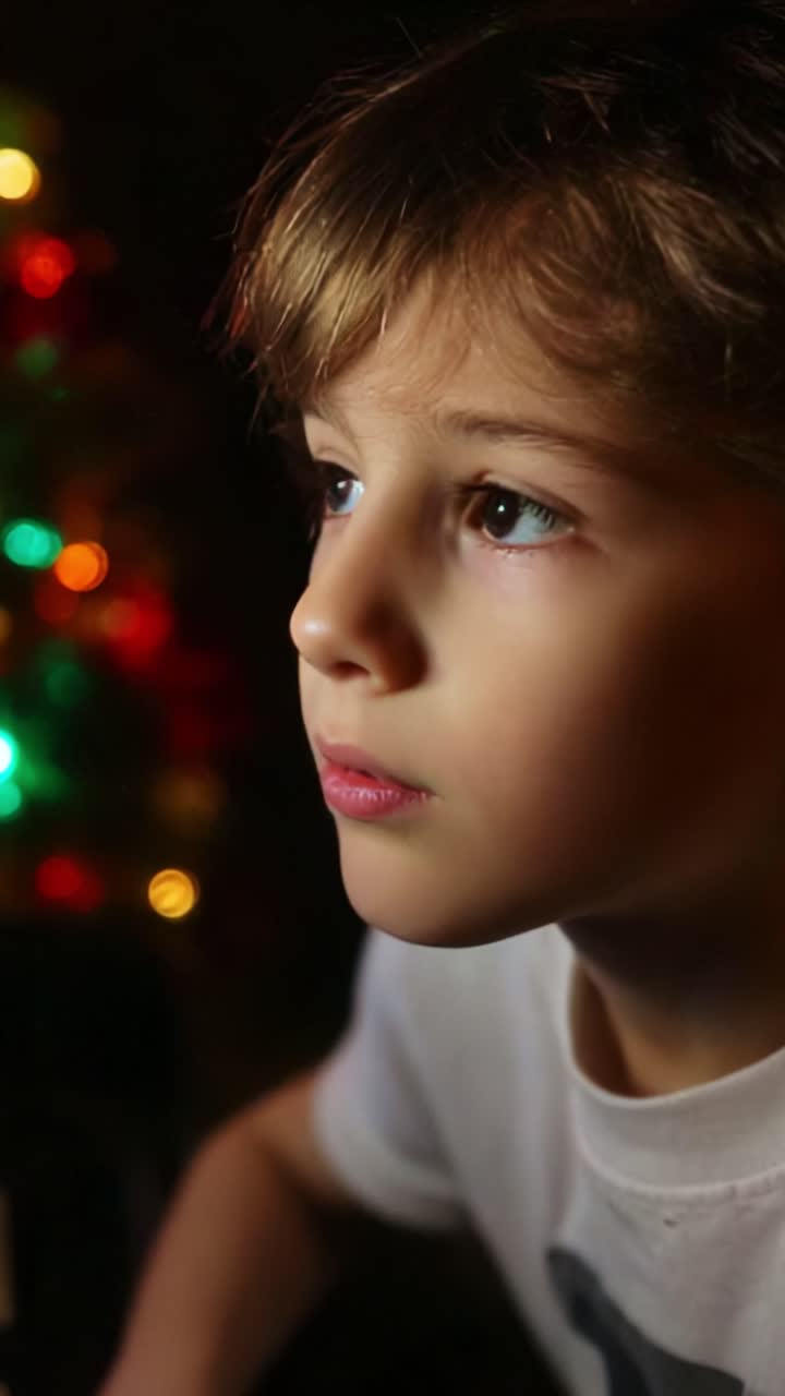 A Close-Up Portrait of a Thoughtful Child with Sparkling Christmas Lights in the Background Capturing the Wonder and Innocence of Youth During the Festive Holiday Season