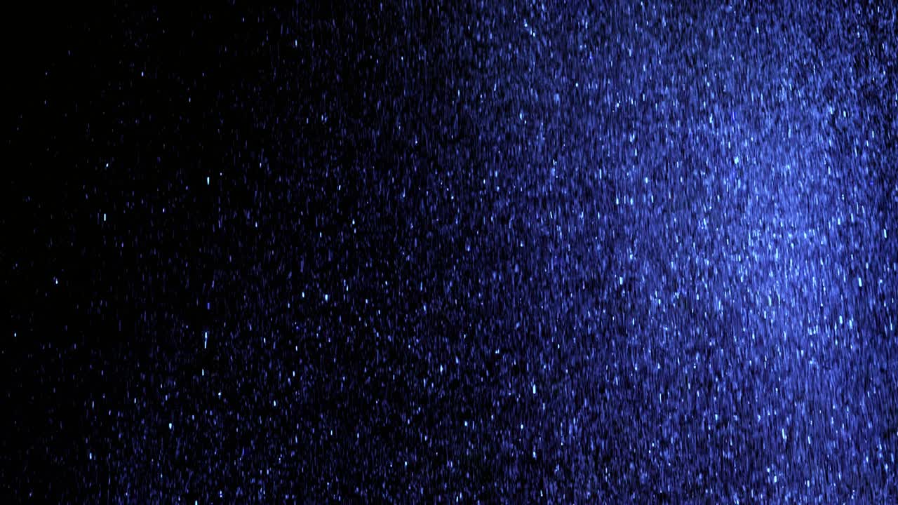 The beautiful falling of glittering particles. slow motion