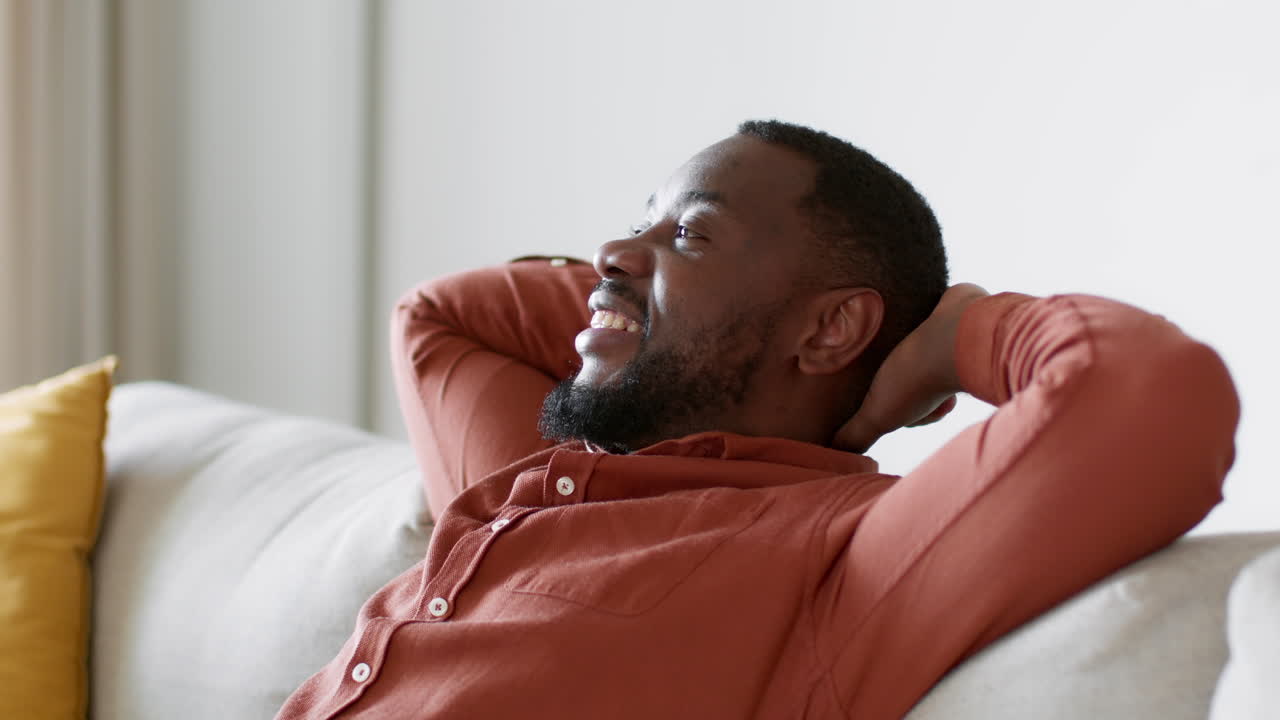 Man Relaxing on a Couch