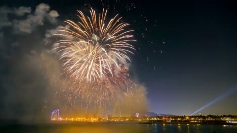 fireworks over the sea in barcelona.time lapse.