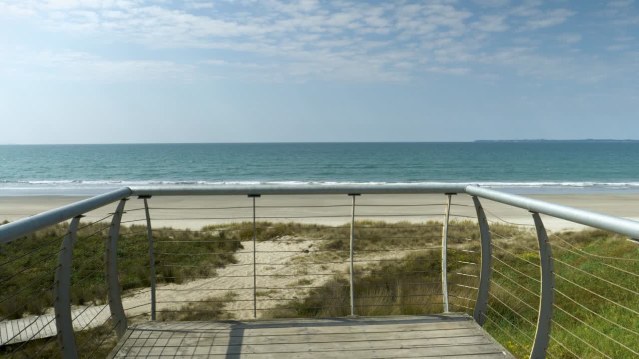 Empty lookout platform over sandy beach