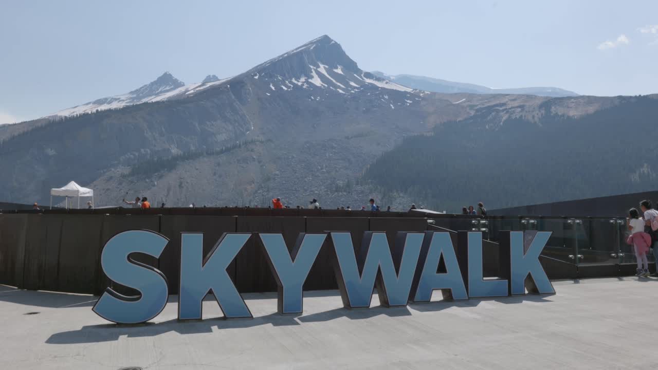 Banff National Park Icefield Skywalk sign, rocky mountains snow background