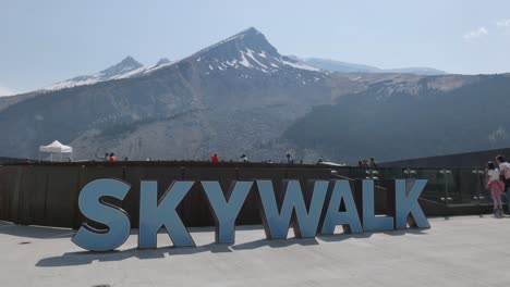 banff national park icefield skywalk sign, rocky mountains snow background