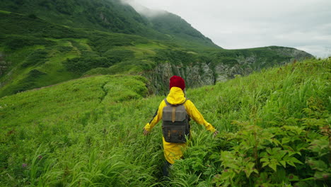 woman hiking in a mountainous landscape