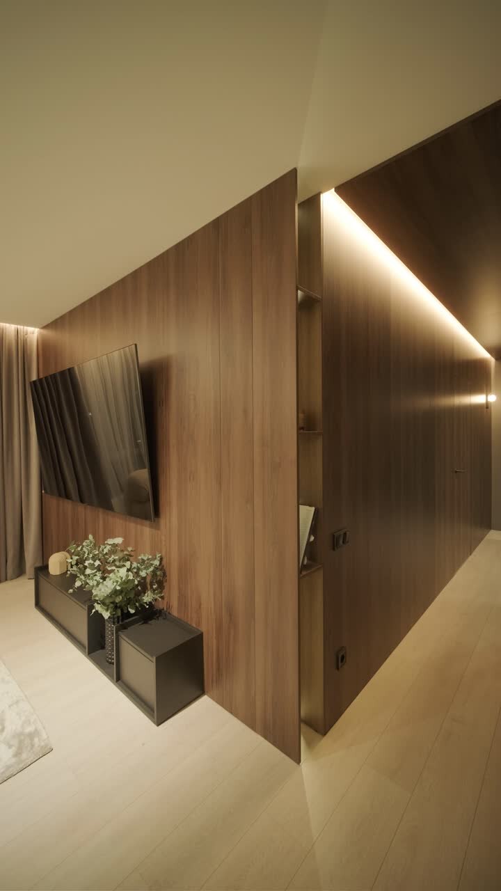 Stylish and elegant minimalist home interior featuring clean lines, neutral colors, and warm ambient lighting, creating a cozy and modern atmosphere.