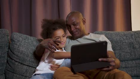 family watching film at home