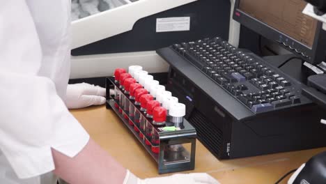 laboratory technician working with blood samples