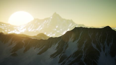 winter landscape in mountains at sunset