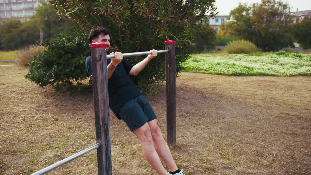Effort Of An Athlete Training His Arms Outdoors At The Park