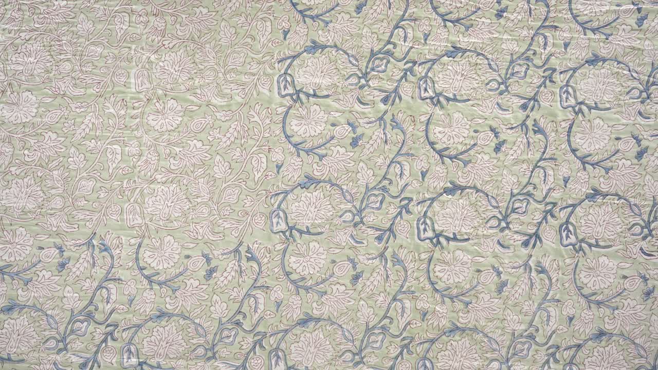 Closeup of handblock printing in organic cotton textile