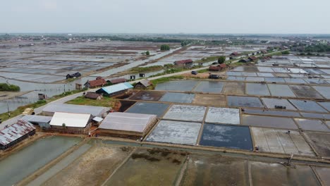 aerial view of view of the vast expanse of salt ponds in jepara, central java, indonesia