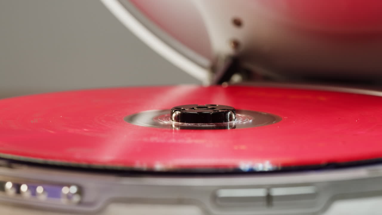 Vintage cd music player close-up. Using portable music player for listening with compact disc