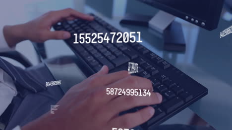 animation of multiple changing numbers over mid section of a man typing on keyboard at office