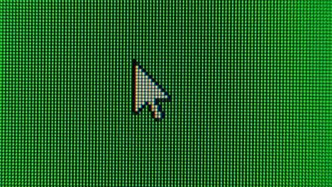la flecha del cursor se mueve a través de la pantalla verde y resalta un área. los píxeles del monitor de pantalla se acercan