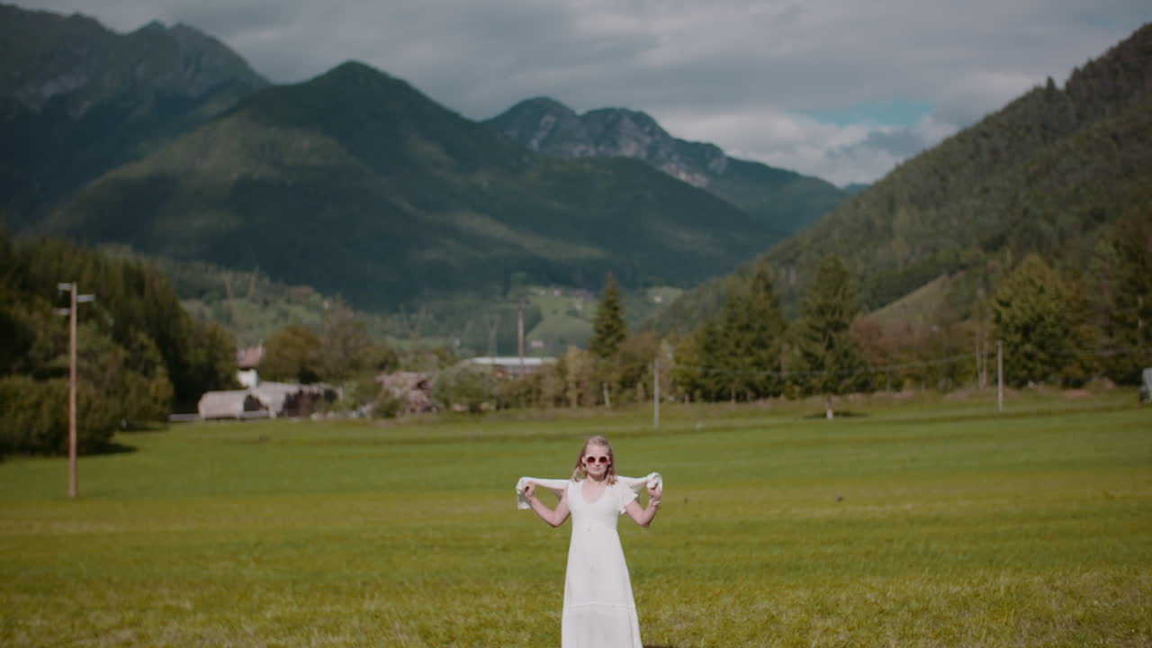 Contemplative Woman with Alpine Mountain View