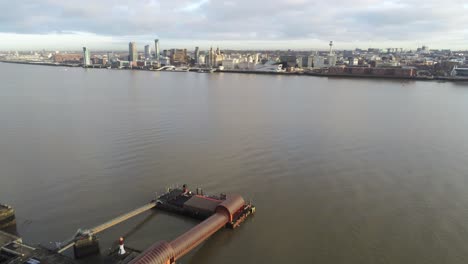 Woodside-ferry-village-terminal-aerial-orbit-left-view-Birkenhead-Liverpool-harbour-skyline