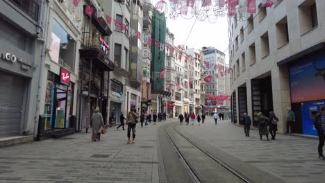 people walking down a busy street in istanbul, turkey