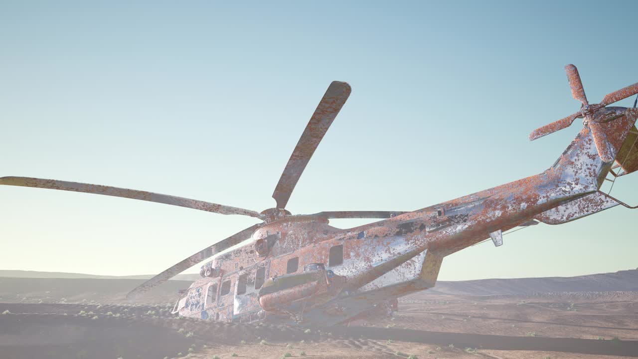 viejo helicóptero militar oxidado en el desierto al atardecer