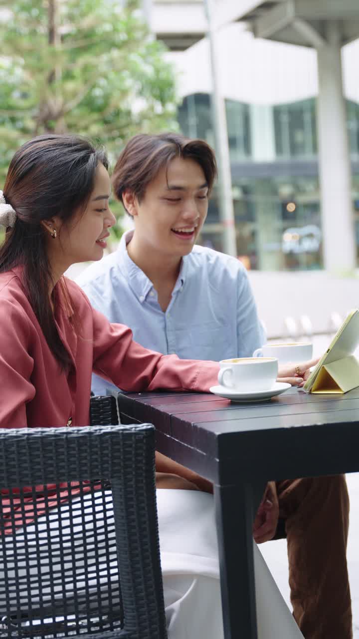 People having coffee at an outdoor cafe