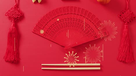 animation of chinese pattern and fan decoration on red background