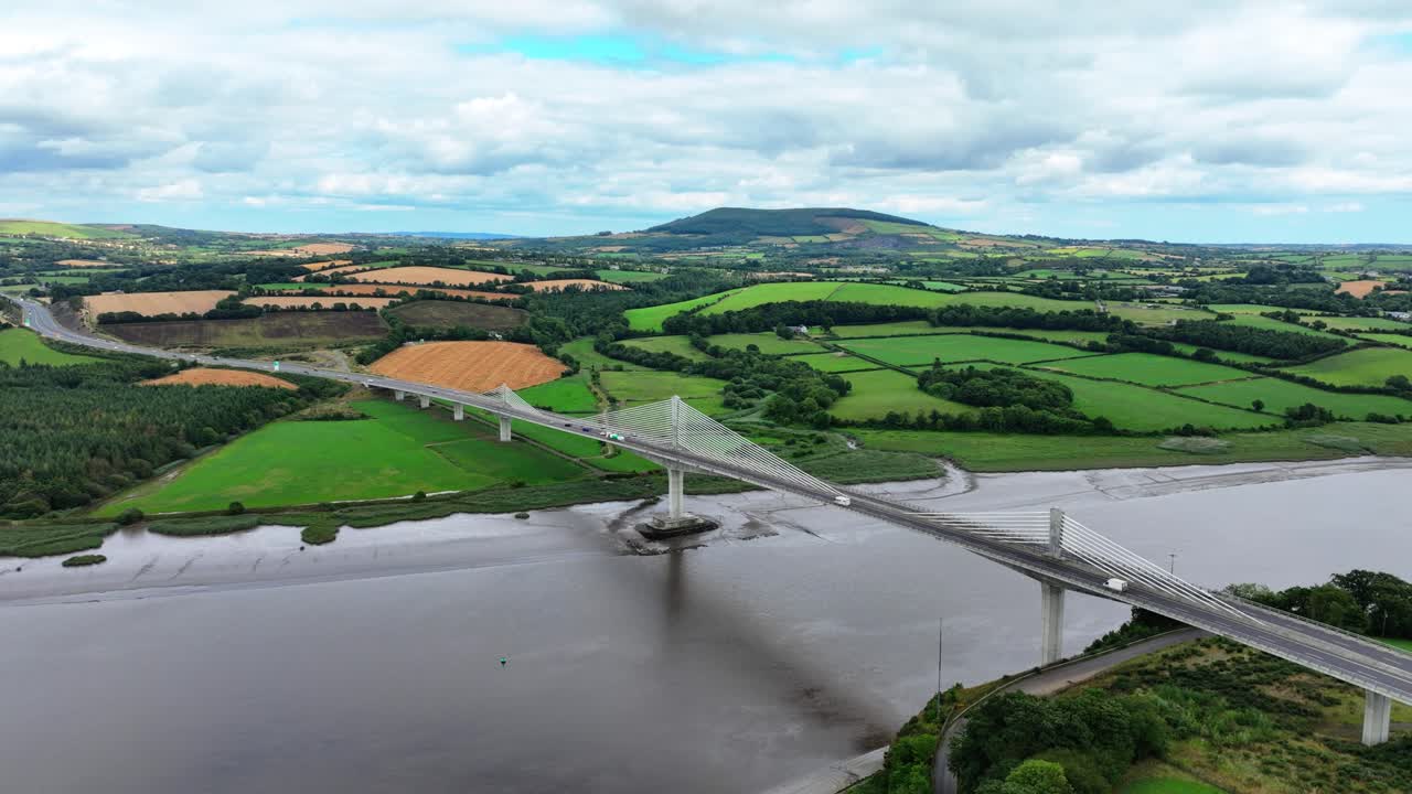 Ireland Epic Locations traffic passing over bridge on the River Barrow to Wexford gateway to Europe