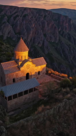 sunrise over a mountaintop church in armenia