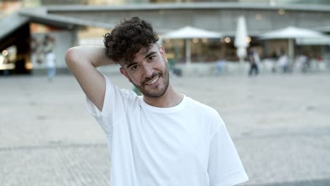 front view of handsome young man looking at camera