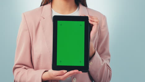 green screen, tablet and hands of woman in studio