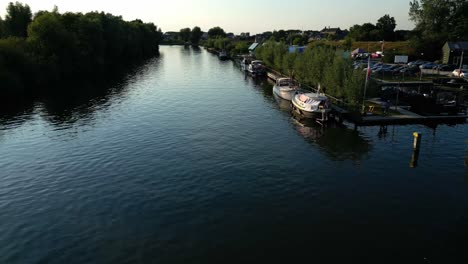 Aerial-Descending-Towards-Calm-Linge-Riverway-In-Arkel