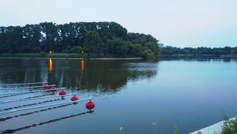 Walking-near-the-lake-of-a-park-in-Bucharest