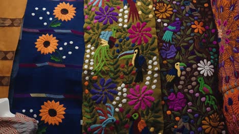 colorful designs and hand-made weaved textiles in zinacantan, chiapas, mexico