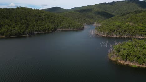 right to left aerial views of advancetown lake near the western boat ramp on the gold coast hinterland.